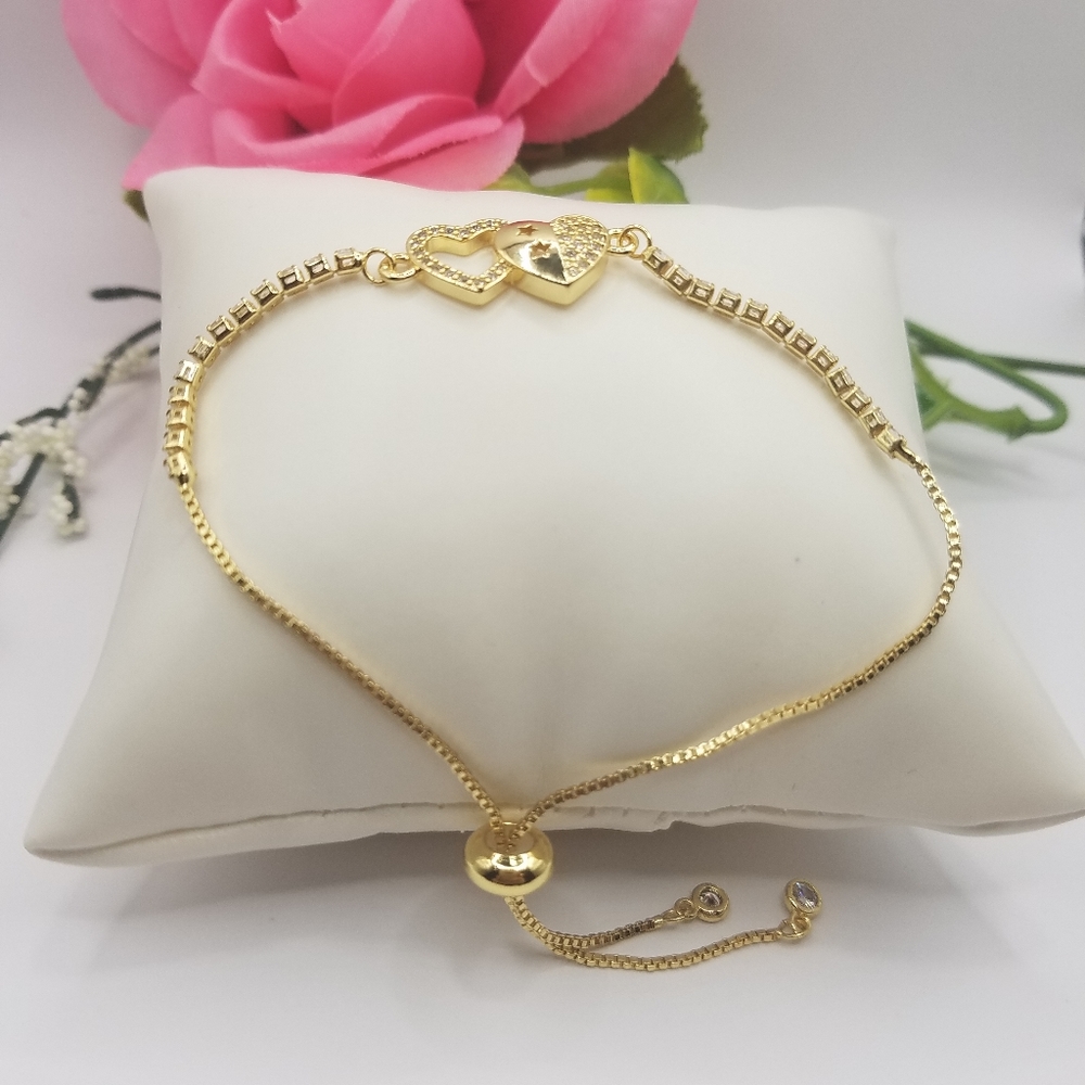 14k gold plated adjustable bracelet with zirconias and hearts